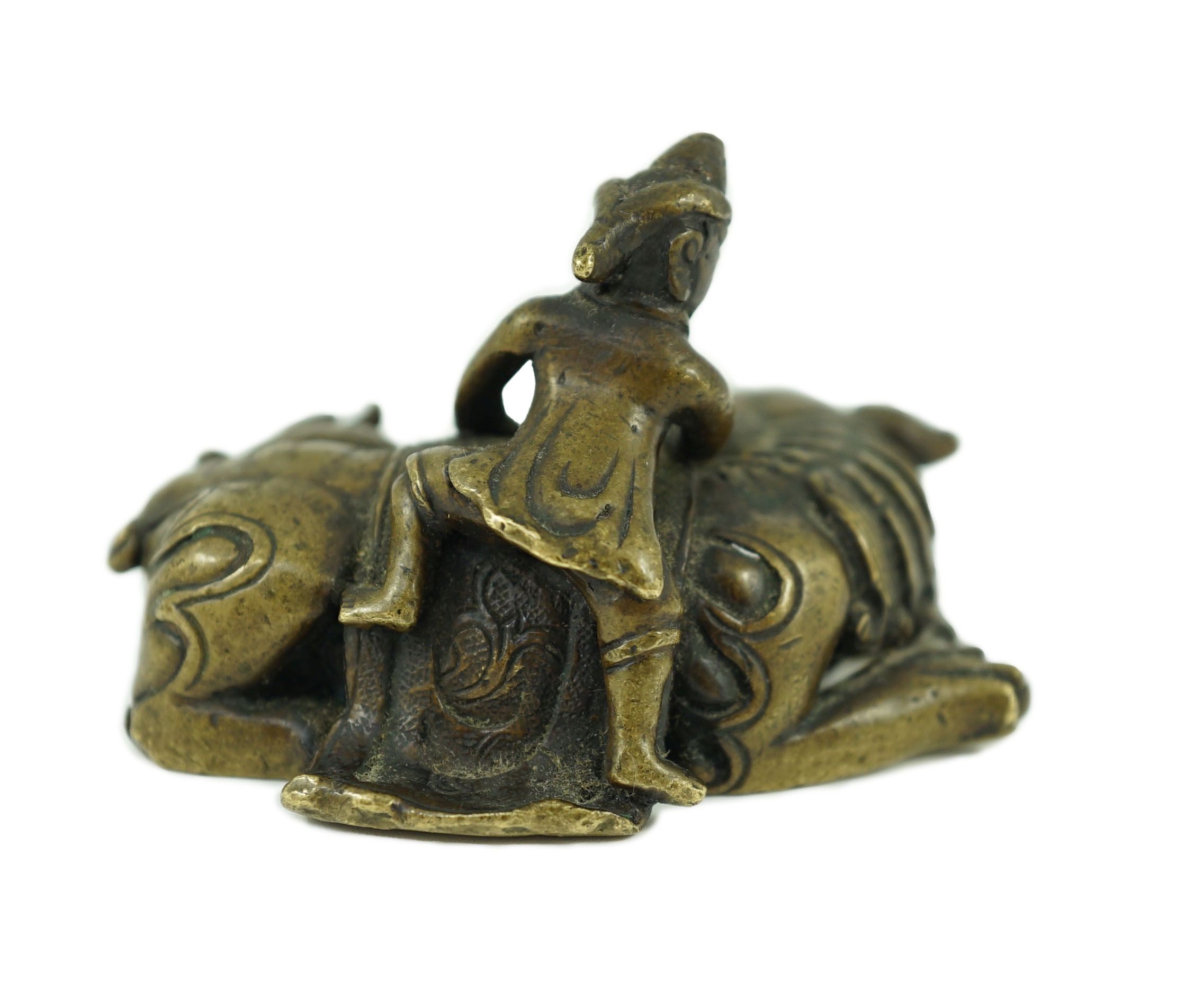 A Chinese bronze ‘Buddhist lion’ scroll weight, 17th/18th century, 6.5cm long